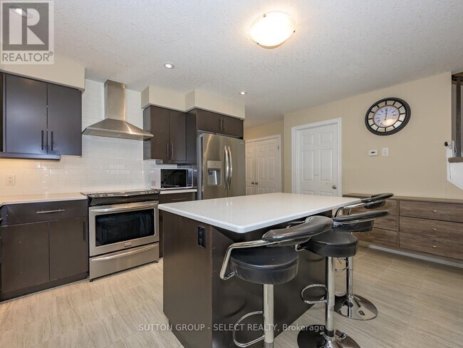 Photo du bâtiment - 1220 Riverbend Rd