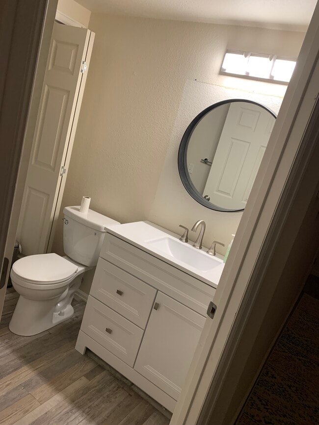 Half bath, washer/dryer in bathroom. - 813 Gabriel Ct