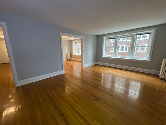2-Bed Apt With Den: Living Room - Windsor Apartments