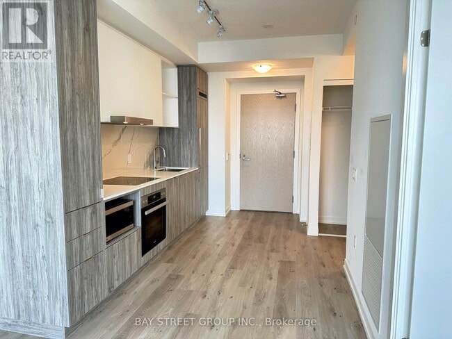 Building Photo - 138-7138 Downes St