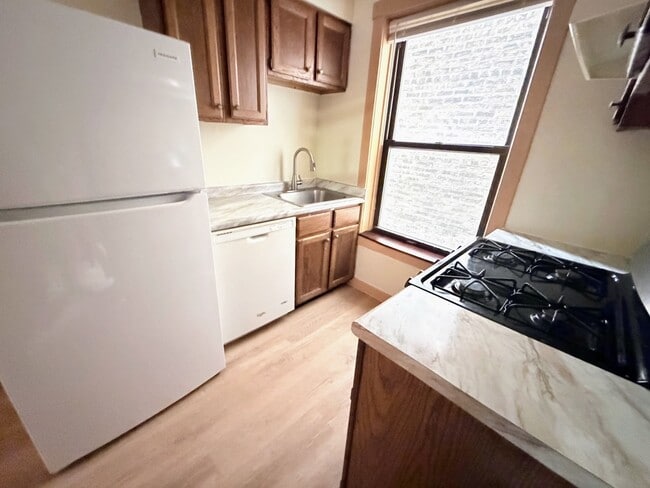 Foto del edificio - 6436 N Hamilton Ave