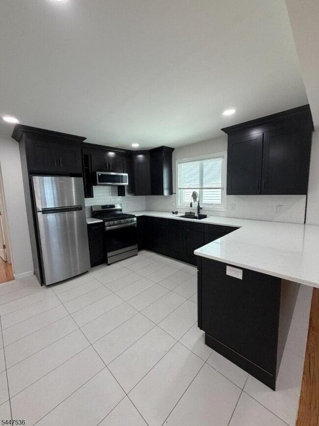 Foto del edificio - 1058 E 25th St