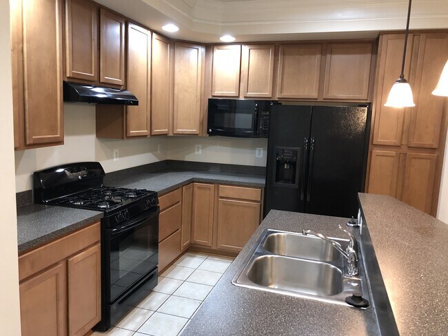 Building Photo - 2 Level Townhouse/condo with one car garage in the Watkins Mill Town Center