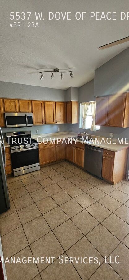 Building Photo - 5537 W Dove of Peace Dr