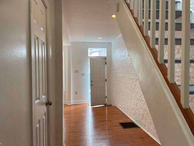 Building Photo - Charming 2-Bedroom, 1.5-Bathroom Brick Townhouse in Pigtown