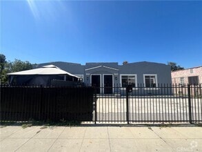 Building Photo - 1702 W 60th St