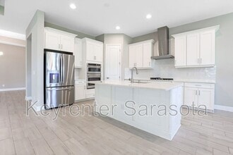 Building Photo - 6133 Lungo Lago Dr