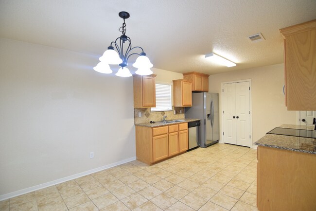 Building Photo - 2506 Traditions Dr