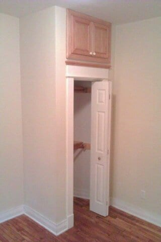 Bedroom #2. Craftily placed over the closet recessed storage and all closet have lights in them. Dual level clothes in rack - 1016 Iglehart Ave