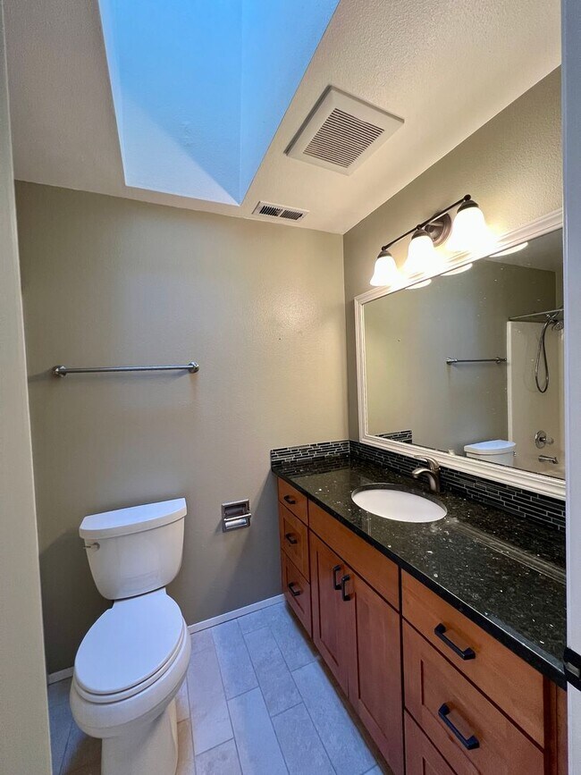Building Photo - Spacious and Serene: Stunning 4-Bedroom Re...