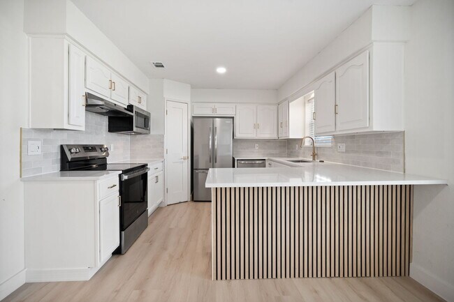 Foto del edificio - 9980 Brockbank Dr