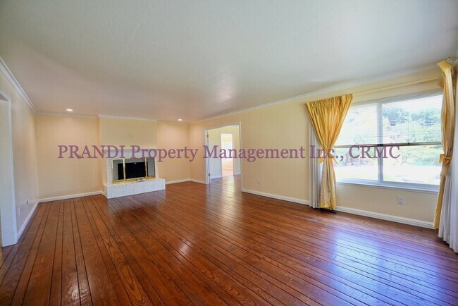 Building Photo - Greenbrae Home with Spacious Yard and Sola...