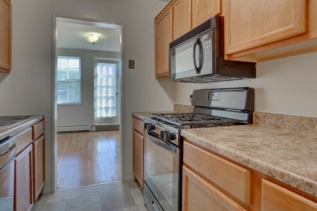 ¡Cocina completamente equipada! - Barrcrest Apartment Homes