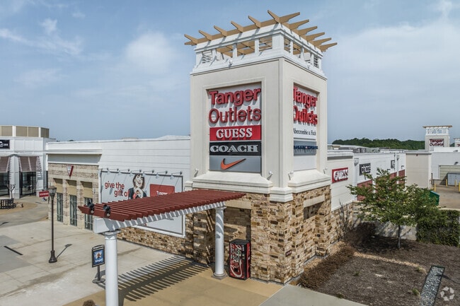 You will find many designer shops at Tanger Outlets.