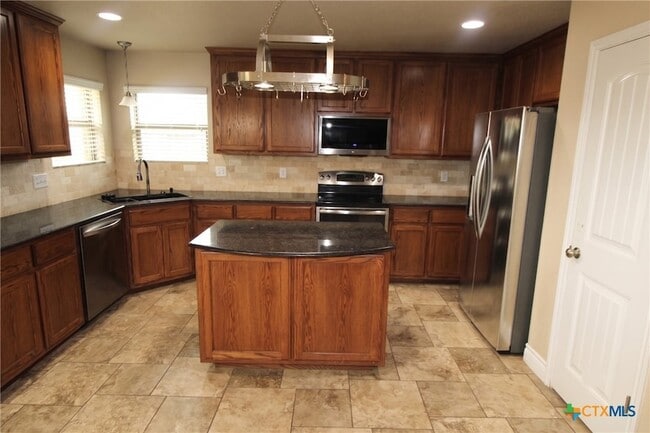 Building Photo - 1128 Pheasant Cir