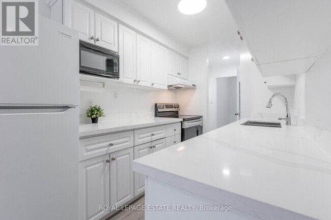 Building Photo - 1040 Victoria Park Ave