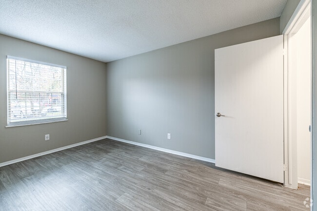 2BR, 1BA - 848SF - Manhattan - Primary Bedroom - Hamptons of Cloverlane Apartments