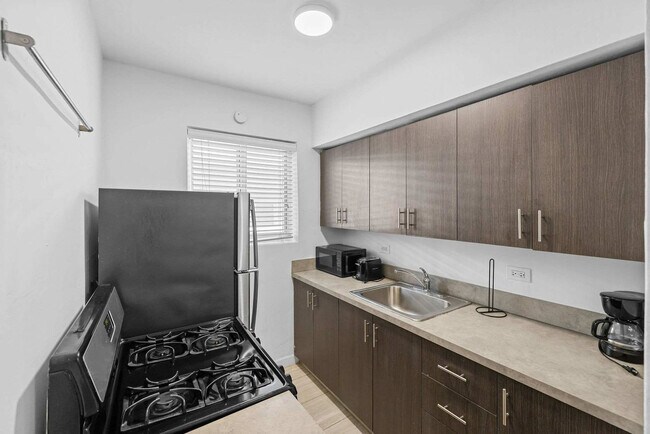 Building Photo - 7340 Harding Ave