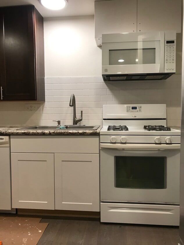 Granite kitchen; stainless steel fridge: gas stove. - 3412 177th Pl SW