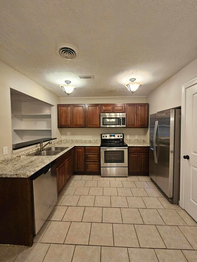 Foto del edificio - 3306 Tanglewood Dr