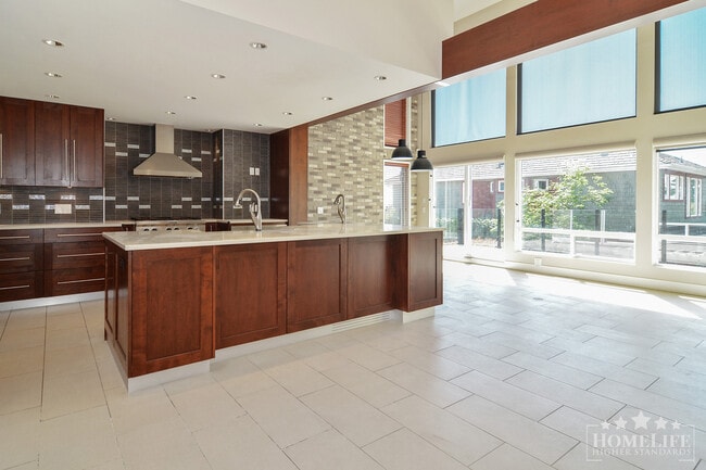 Building Photo - Spacious Executive 5 Bedroom Home with Water Views & Beautiful Outdoor Space