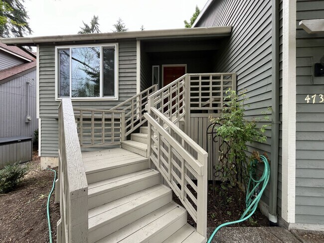 Foto del edificio - Spacious 3-Bedroom Home with Custom Stone Fireplace, Attached 2-Car Garage & Expansive Backyard i...