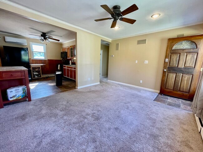 Large living room with built-in surround sound - 4721 Hillside Rd