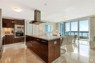 Building Photo - 6899 Collins Ave