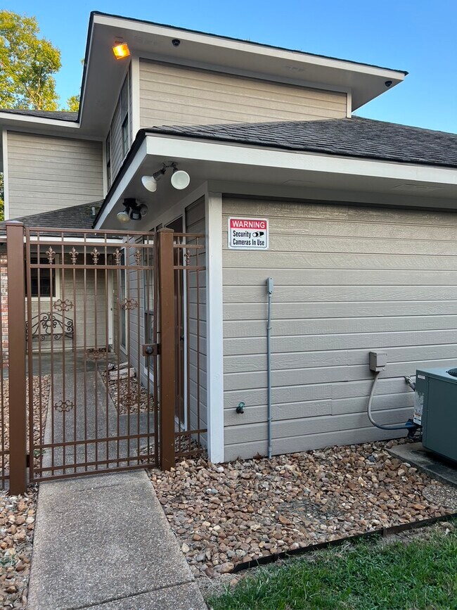 Gated/Locked entrance to residence. - 2210 Jackson St