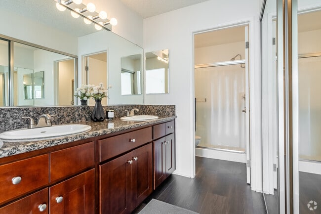 3BR, 2BA - Deauville - 1,300SF - Bathroom - Versailles on the Lake Apartments