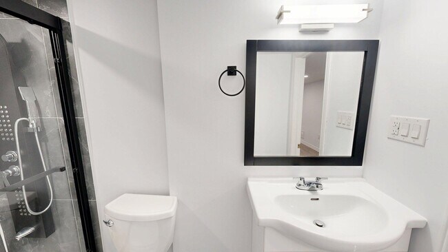 Building Photo - New Renovated lower unit Available now