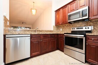 Building Photo - 10127 Boca Bend E