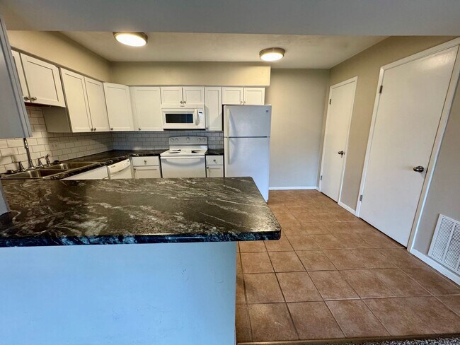 Building Photo - Updated 2BR with Balcony – Second Level Apartment