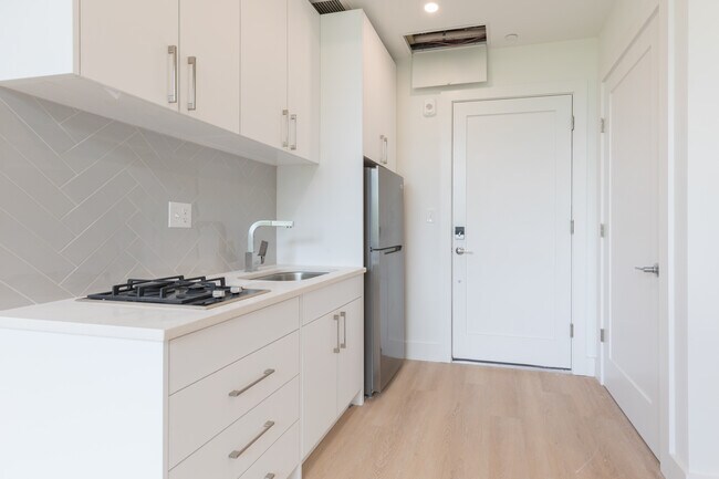 Foto del edificio - 1127 Harrison Ave