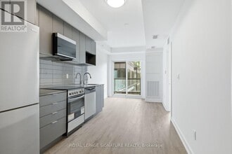 Building Photo - 4569 Kingston Rd