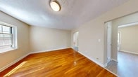 Located at 95 Warren Street, Unit 3B in Nutley, NJ, this 2-bedroom, 1-bathroom residence offers a thoughtfully arranged single-floor layout with a welcoming entrance that flows into the main living areas. The living room is a standout space, characterized by rich, gleaming hardwood floors, a textured ceiling, and a pair of windows that invite natural light and views of surrounding greenery. The dining room and living room together create a comfortable, open feel ideal for everyday living and entertaining.

The kitchen features white shaker-style cabinetry, granite countertops with subtle gray veining, a stainless steel sink, and light-toned flooring — delivering a clean, functional workspace. Both bedrooms continue the warm hardwood flooring found throughout, with the primary bedroom offering a generous footprint, a window with natural light, and a radiator for heating. The second bedroom is equally bright and well-proportioned.

The bathroom is finished in a crisp, all-white palette with subway tile surrounding the tub-shower combo, a white vanity with an integrated sink, a medicine cabinet mirror, and a window for ventilation. Five closets distributed throughout the unit provide exceptional storage. Neutral wall tones and consistent finishes create a cohesive, move-in-ready ambiance throughout.