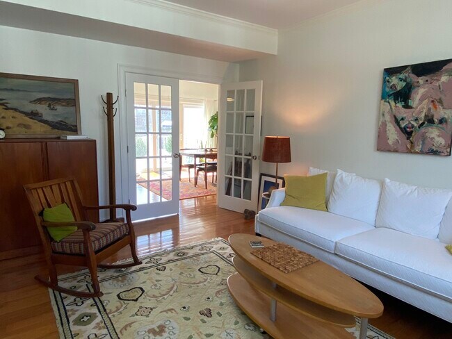 Living room with French doors to dining room. - 8 Slocum St