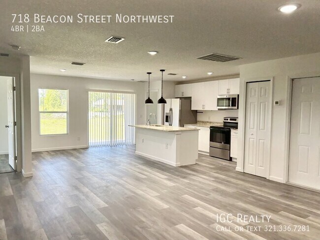 Building Photo - "Modern 4-Bedroom Home with Granite Counte...