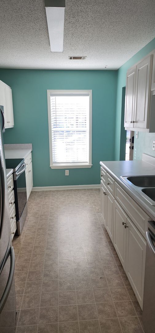 Building Photo - Cute 2 Bedroom 2 Bath Patio Home Twin Eagl...