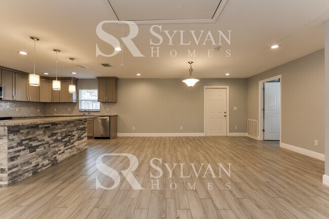 Building Photo - Enjoy living the good life in this 5 bedro...