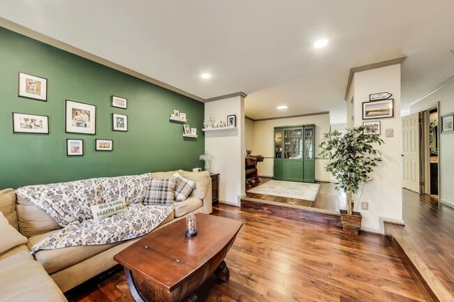Building Photo - COMINGS SOON - Beautifully Updated Winchester-Built Townhome Backing to Serene Parkland.