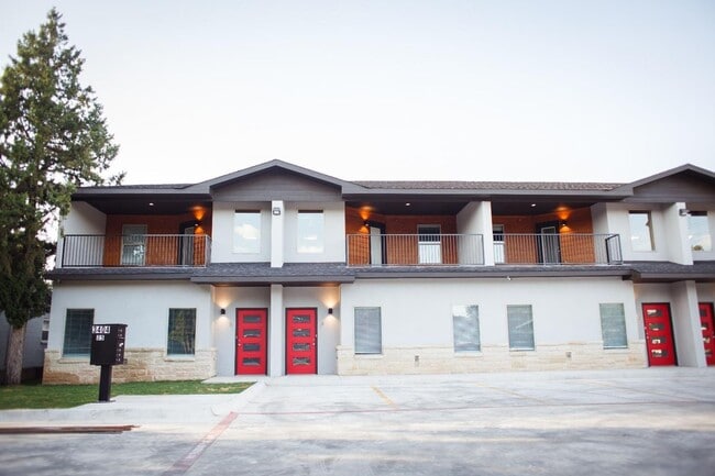 Building Photo - AUGUST MOVE-IN SPECIAL: 4 Private Suites • Walk to Texas Tech • Modern Finishes