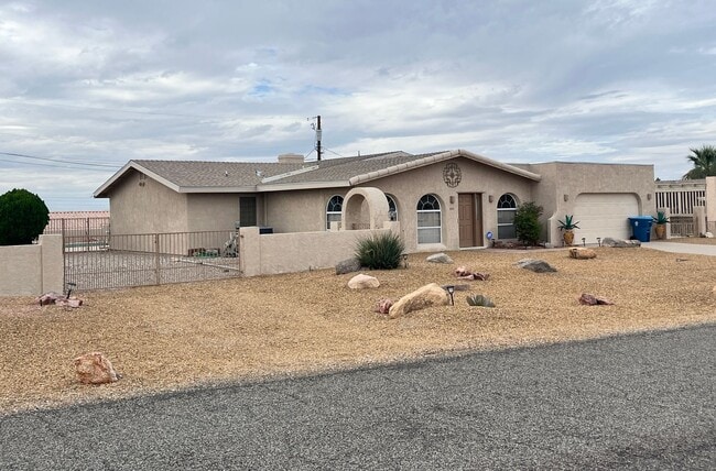 Building Photo - Beautifully Fully Furnished Longterm Pool Home