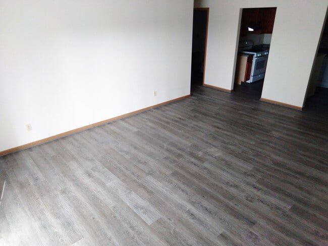 Capitol Pointe Living Room - Capitol Pointe Apartments