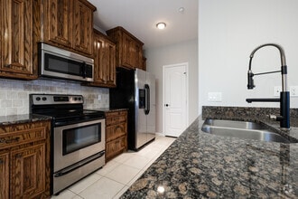 Building 2- 2BR, 2BA - 1,095 - Kitchen - Presidential Shores