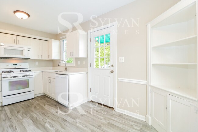 Building Photo - Enjoy living the good life in this 4 bedro...