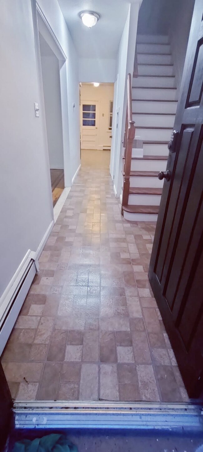 New Flooring in hallway and kitchen - 2919 Harding Ave