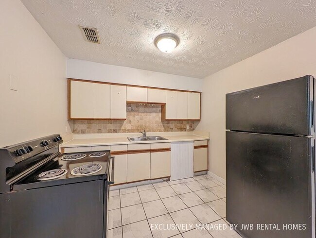 Foto del edificio - 7363 Melvin Rd