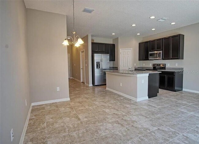 Foto del edificio - 7026 Woodchase Glen Dr