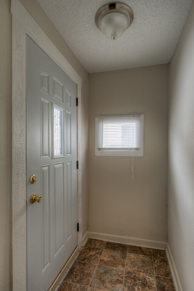 Building Photo - Refinished 2 Bedroom with Garage